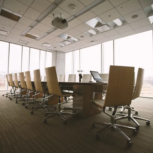 Commercial office with beige carpet flooring
