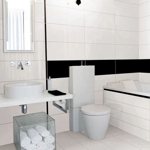 Modern bathroom with tile walls